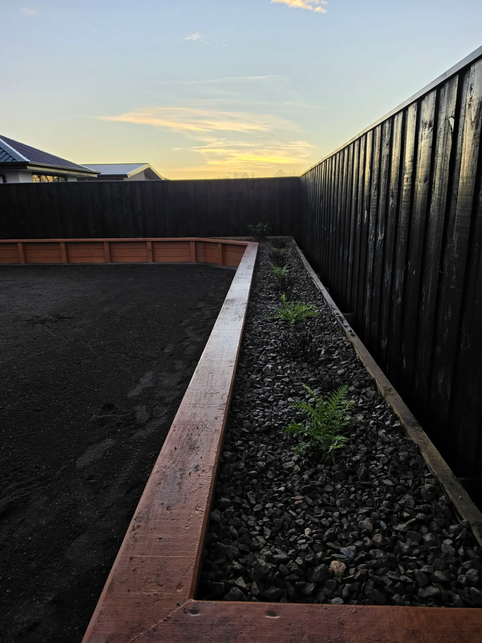 Side yard pathway and boundary fencing at 25 Derbridge Street landscaping project