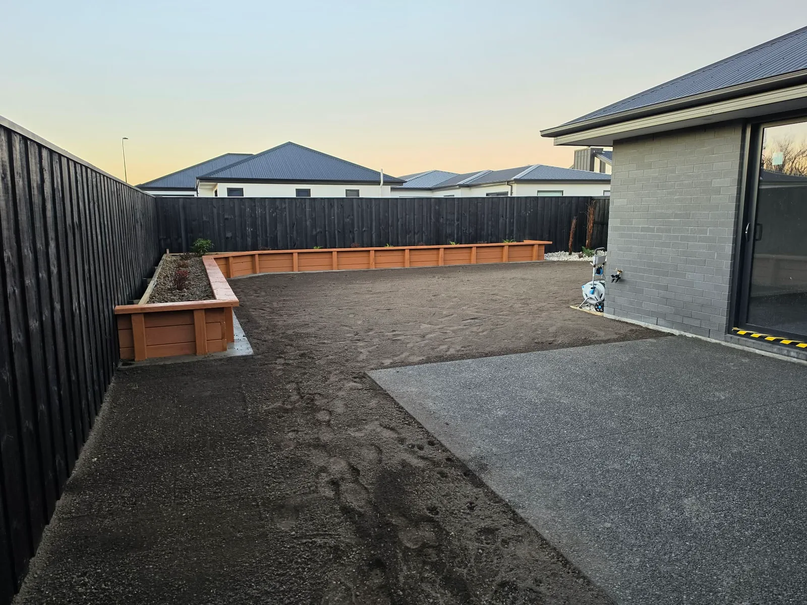 Pathway and garden areas around the new build at 25 Derbridge Street, Christchurch
